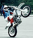 Motorcycle star does wheelie with his bike